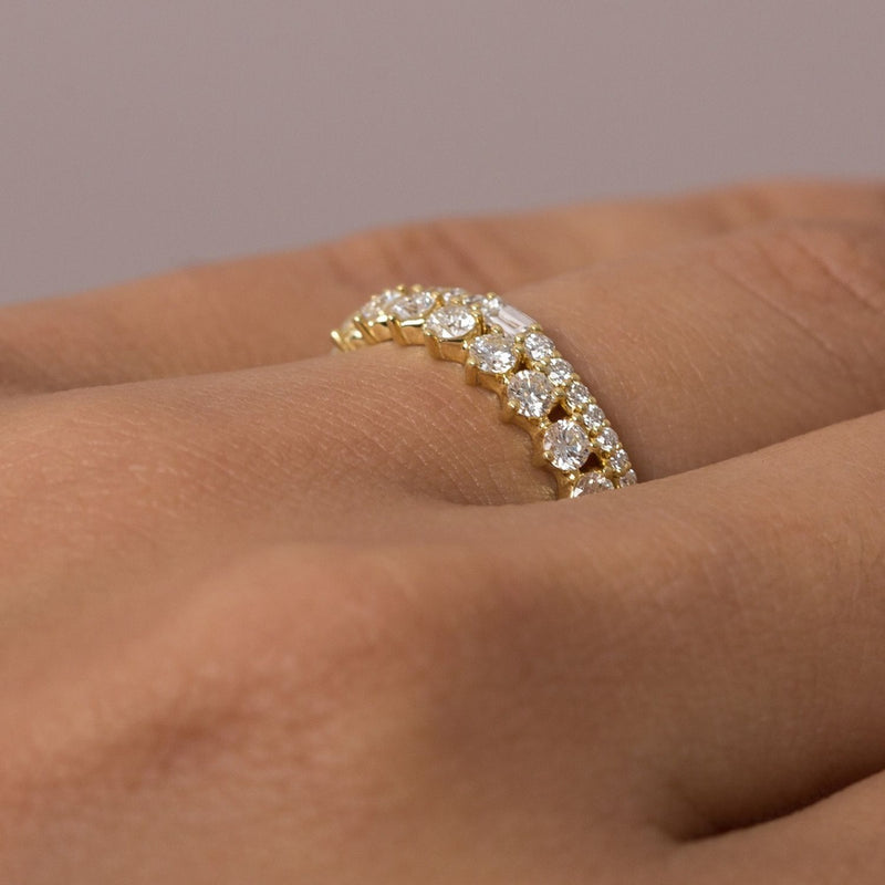 Lamont designer diamond band with baguette and tapering round diamonds in gold