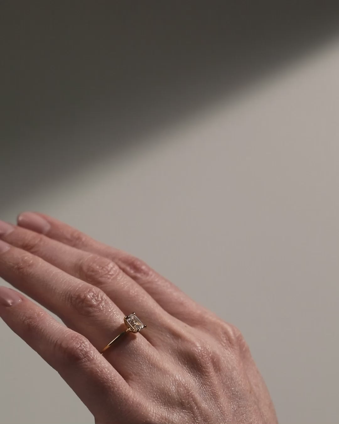 shape_emerald solitaire emerald cut diamond engagement ring gold