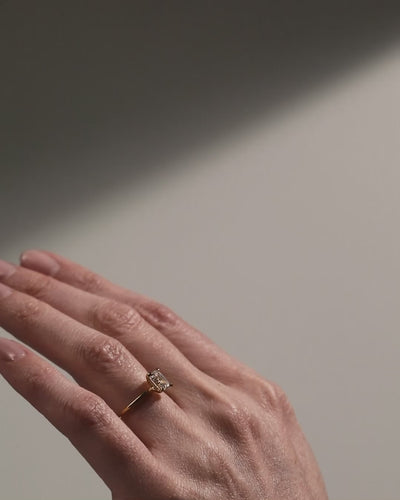 shape_emerald solitaire emerald cut diamond engagement ring gold